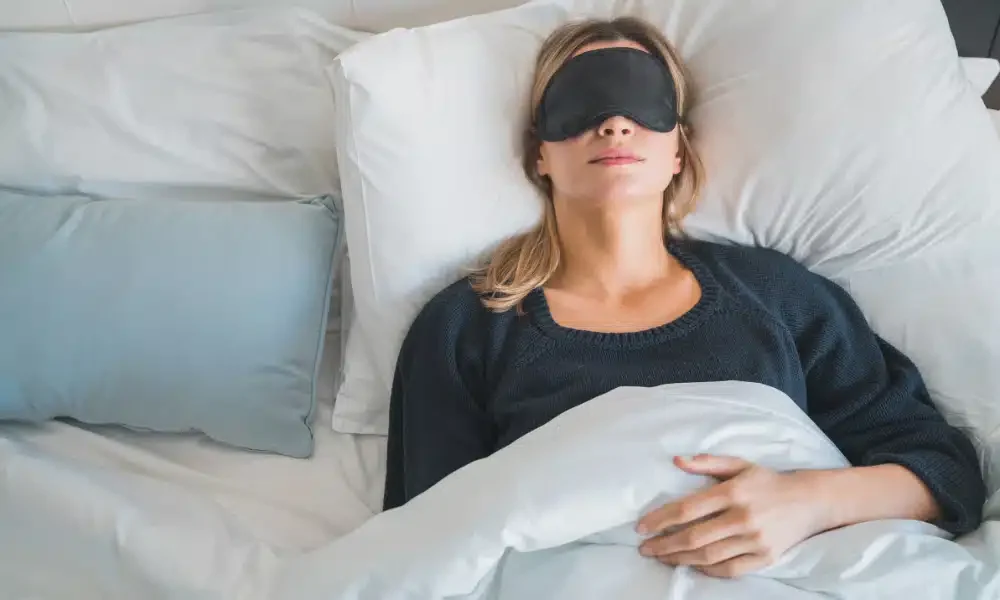 sleeping woman with mask
