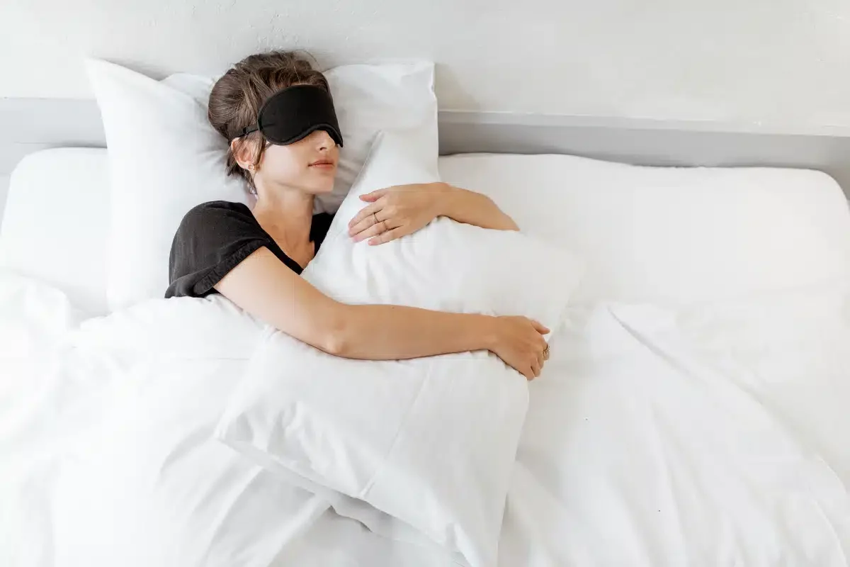 sleeping woman with mask