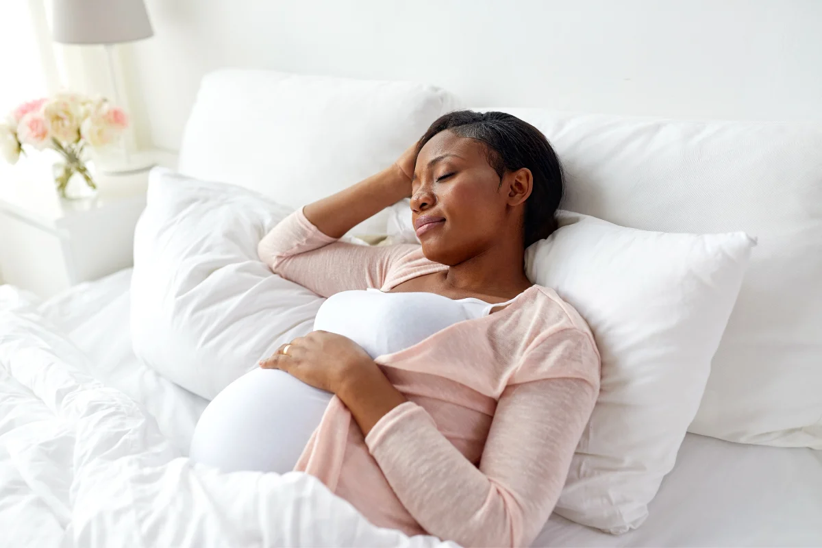 pregnancy woman on the bed